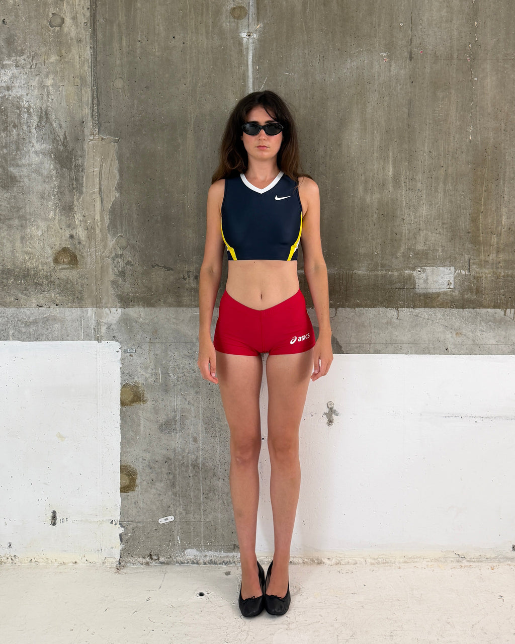 Asics red mini shorts